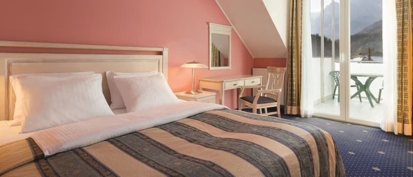 Ramada and Suites Balcony bedroom