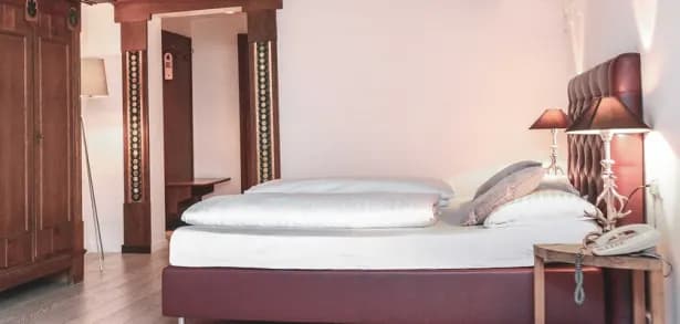 doppelzimmer_hahnenkamm_bett2